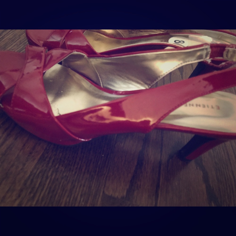 Red open toe pumps